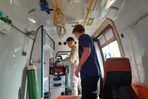 Medical volunteers providing patient care at a mobile clinic